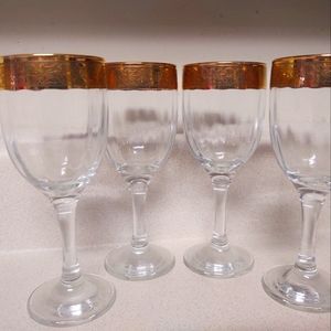 Vintage gold rim stemmed wine glasses